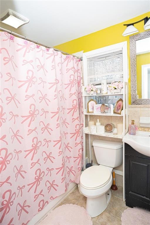 bathroom featuring visible vents, toilet, curtained shower, tile patterned flooring, and vanity