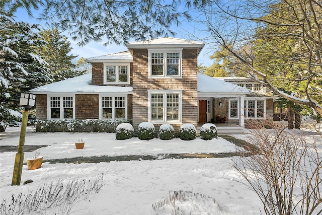 view of snow covered house