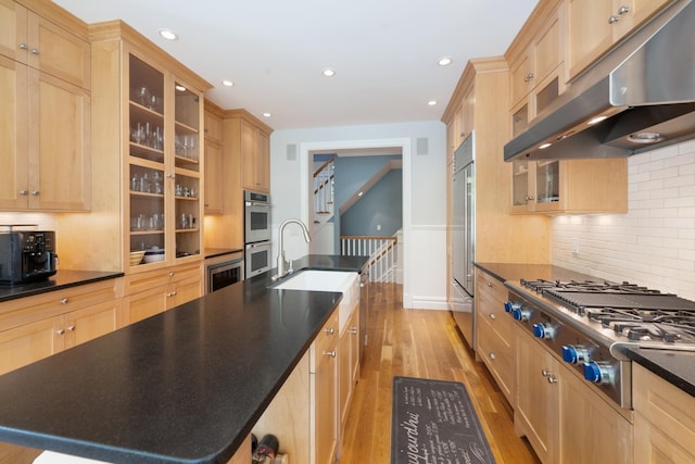 9 Owls Nest Ln, East Hampton, NY 11937 - kitchen featuring under cabinet range hood, stainless steel appliances, light brown cabinetry, and recessed lighting