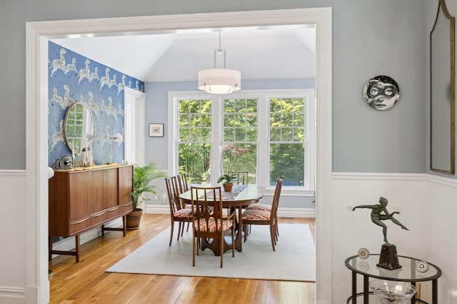 9 Owls Nest Ln, East Hampton, NY 11937 - dining room with a wainscoted wall, light wood-type flooring, and vaulted ceiling