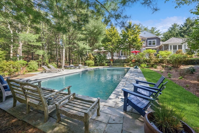 9 Owls Nest Ln, East Hampton, NY 11937 - outdoor pool with a patio area