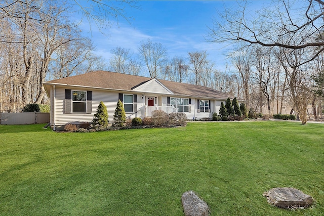 single story home with a front lawn