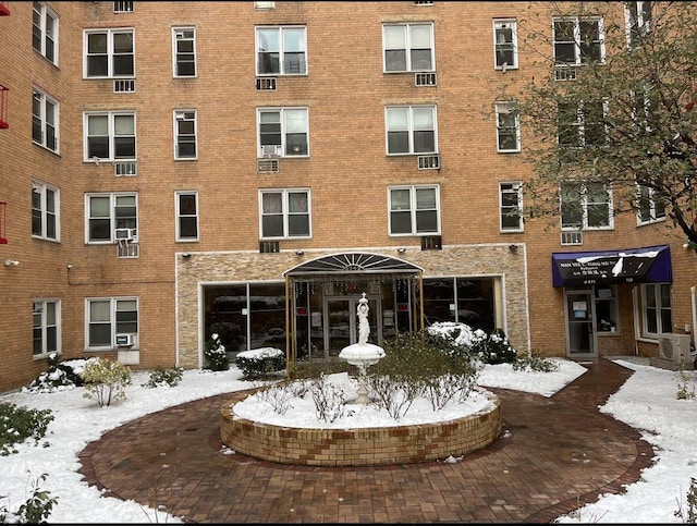 view of snow covered property