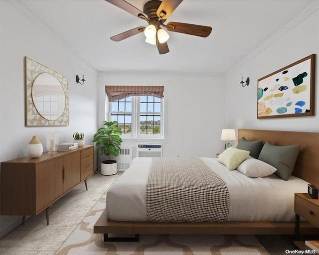 carpeted bedroom with radiator heating unit, ornamental molding, a wall unit AC, and ceiling fan