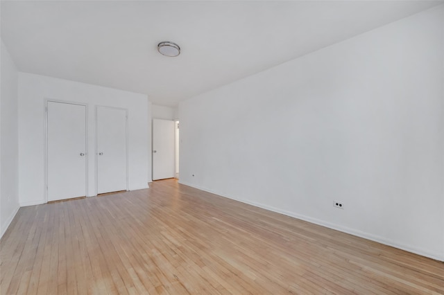 unfurnished bedroom with light hardwood / wood-style flooring