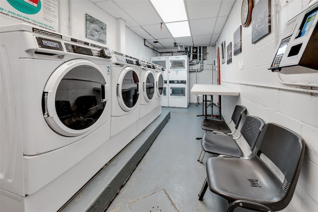 laundry area with washing machine and dryer