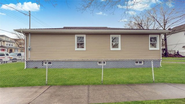 view of home's exterior with a lawn