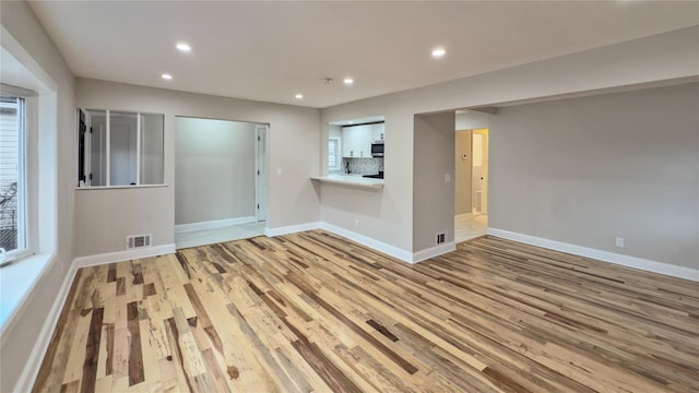 interior space with a healthy amount of sunlight and light wood-type flooring