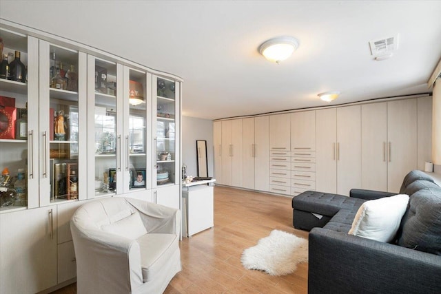 living room with light hardwood / wood-style floors