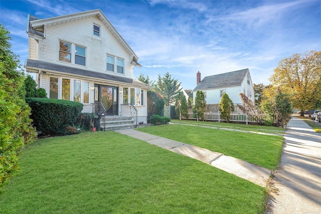 view of front of house with a front yard