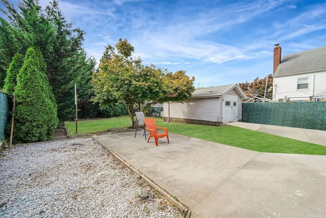 view of patio featuring a storage shed