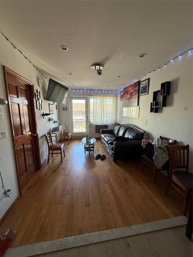 living room with hardwood / wood-style floors