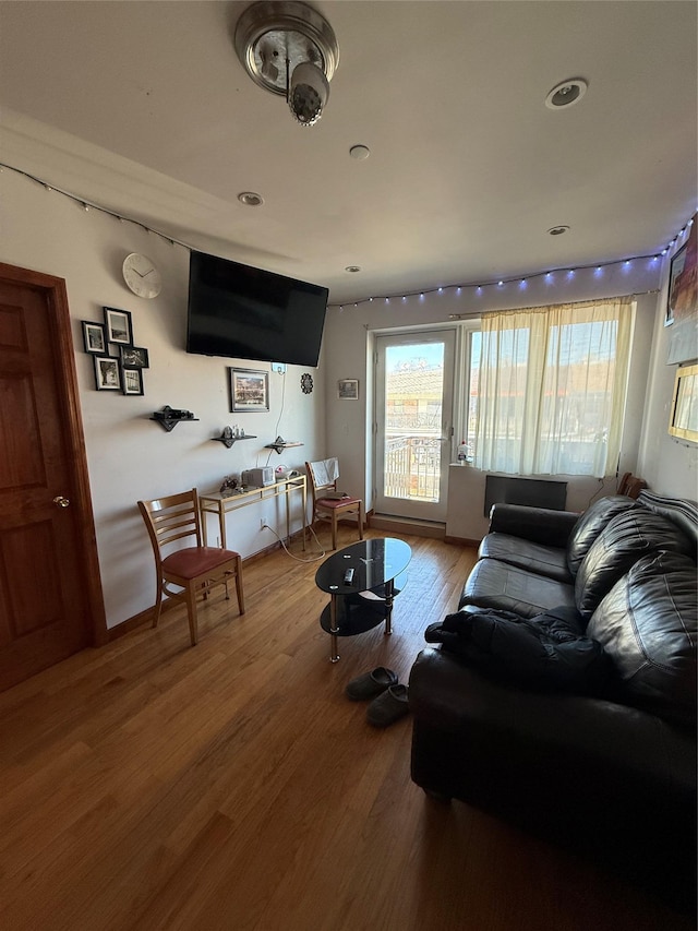 living room with hardwood / wood-style flooring