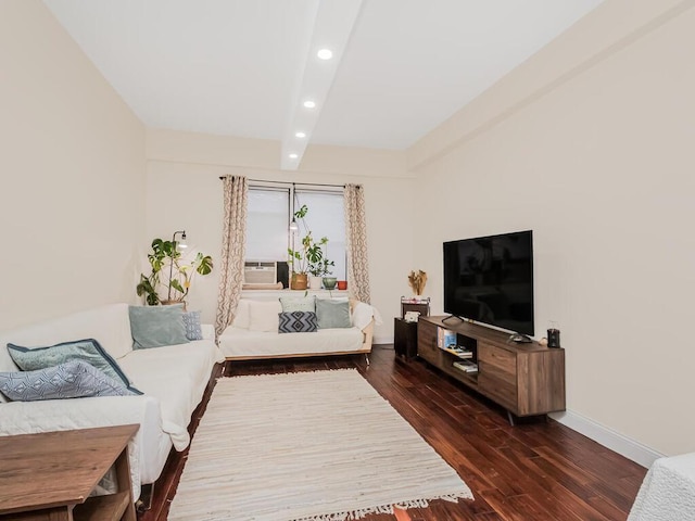 living room with beamed ceiling, dark hardwood / wood-style floors, and cooling unit