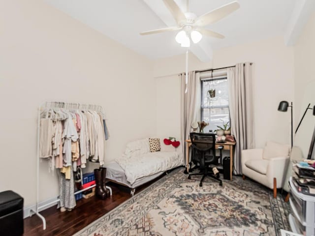 sitting room featuring ceiling fan and dark hardwood / wood-style flooring