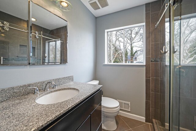 15 Bart Dr, Selden, NY 11784 - full bath featuring visible vents, toilet, a shower stall, vanity, and tile patterned flooring