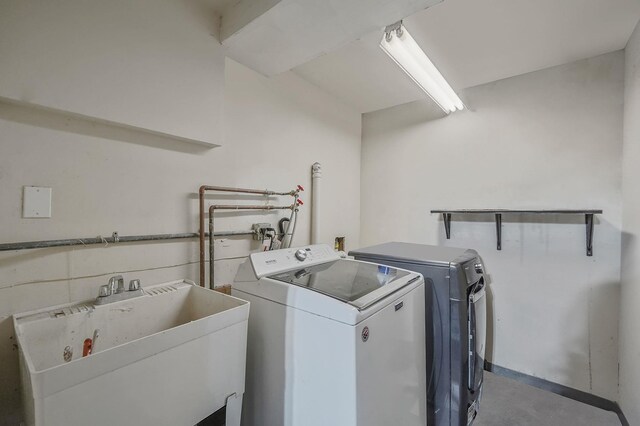 15 Bart Dr, Selden, NY 11784 - laundry room featuring laundry area, a sink, and washer and clothes dryer