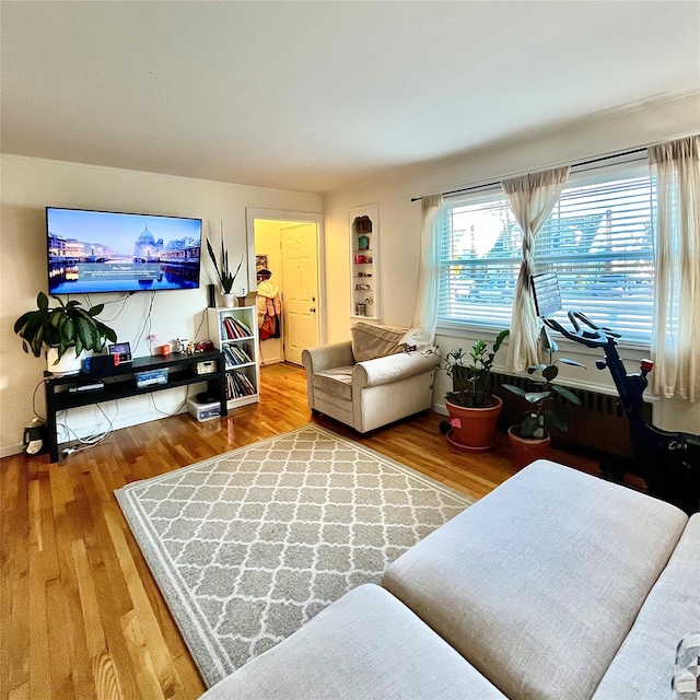 living room with wood finished floors