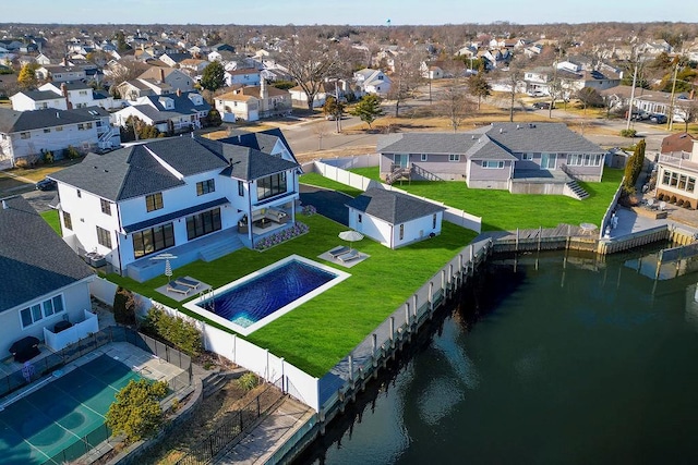 drone / aerial view with a water view