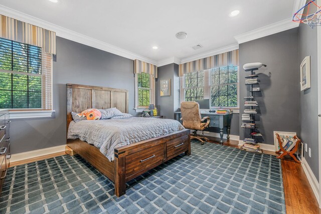 bedroom featuring recessed lighting, dark wood-type flooring, visible vents, baseboards, and ornamental molding