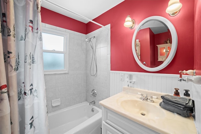 bathroom with shower / bath combo with shower curtain and vanity