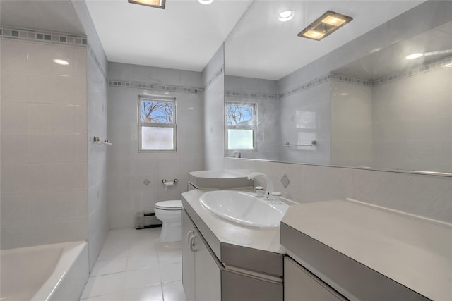 bathroom featuring a baseboard radiator, tile walls, tile patterned flooring, vanity, and toilet