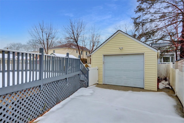 view of snow covered garage