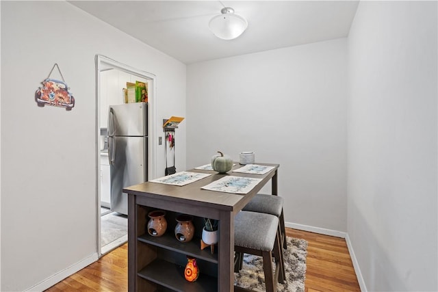 dining area featuring hardwood / wood-style flooring