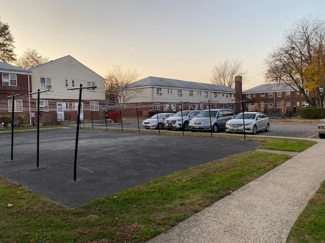 view of parking at dusk