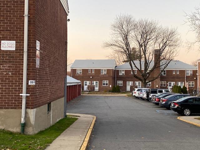 view of parking at dusk