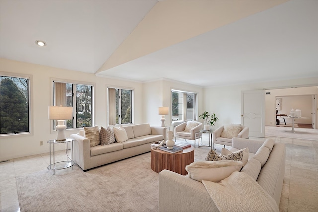 living room featuring lofted ceiling and recessed lighting