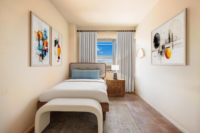 70-25 Yellowstone Blvd Unit 18A, Forest Hills, NY 11375 - bedroom featuring wood finished floors and baseboards