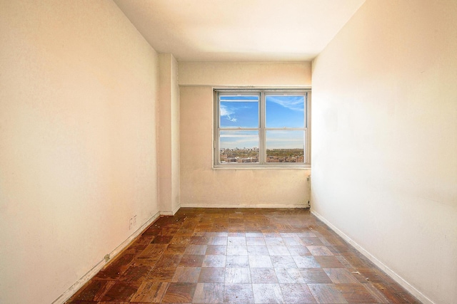 70-25 Yellowstone Blvd Unit 18A, Forest Hills, NY 11375 - empty room featuring baseboards