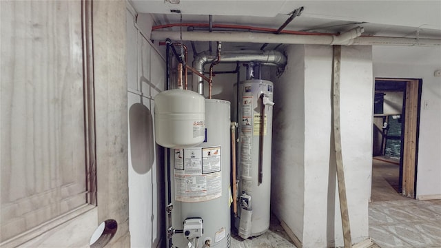 utility room with gas water heater