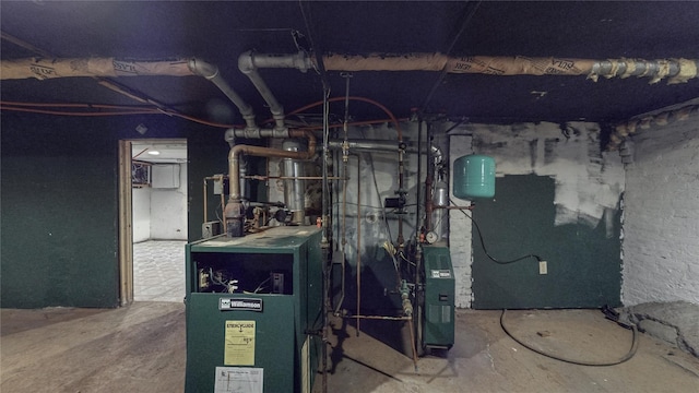 utility room featuring a heating unit