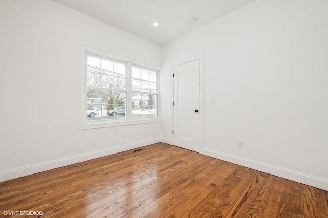 2101 Fir St, Wantagh, NY 11793 - spare room with baseboards and wood finished floors