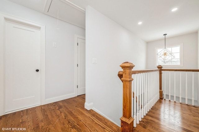 2101 Fir St, Wantagh, NY 11793 - hall featuring attic access, wood finished floors, an upstairs landing, and recessed lighting