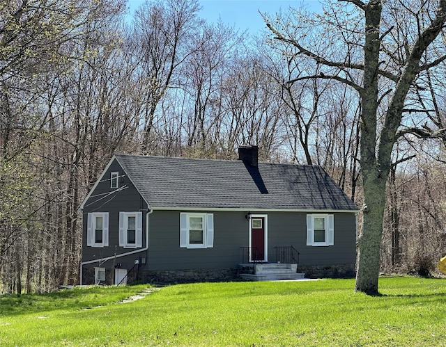 view of front of home with a front lawn