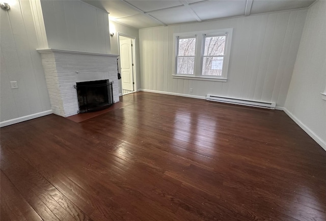 unfurnished living room featuring a baseboard radiator, a fireplace, and dark hardwood / wood-style flooring