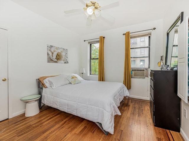 91 E 208th St Unit 3K, Bronx, NY 10467 - bedroom featuring ceiling fan, baseboards, and hardwood / wood-style floors