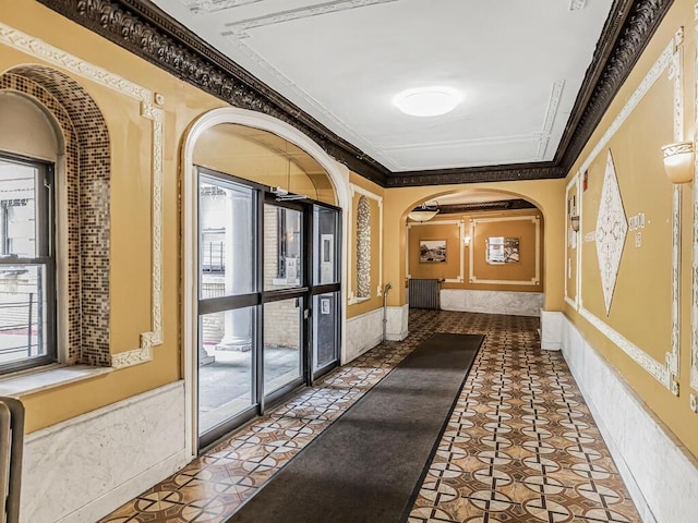 91 E 208th St Unit 3K, Bronx, NY 10467 - corridor with arched walkways and crown molding
