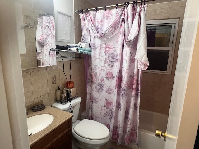 bathroom featuring toilet, vanity, tile walls, decorative backsplash, and shower / bath combination with curtain