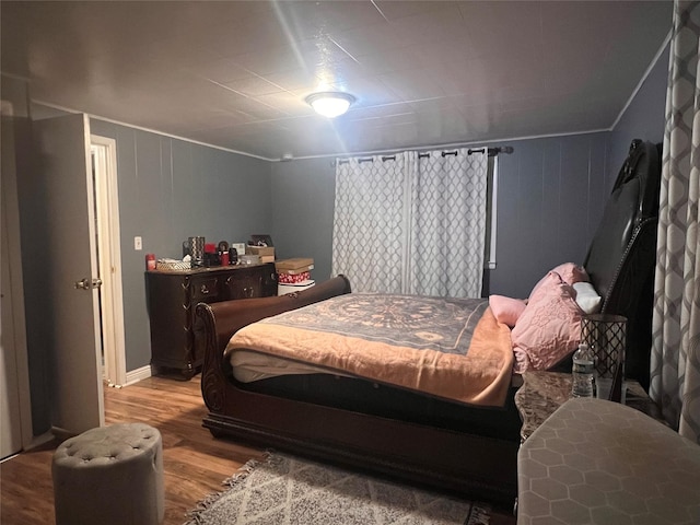 bedroom featuring light wood-style flooring