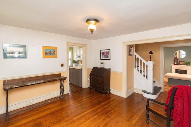 807 Lucas Avenue Ext, Hurley, NY 12443 - sitting room featuring wood finished floors, stairway, and baseboards