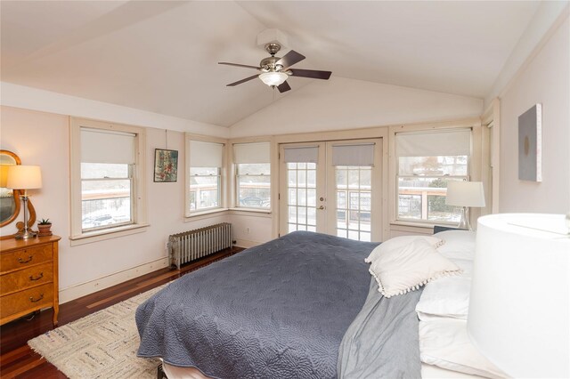 807 Lucas Avenue Ext, Hurley, NY 12443 - bedroom featuring radiator heating unit, french doors, access to exterior, wood finished floors, and vaulted ceiling