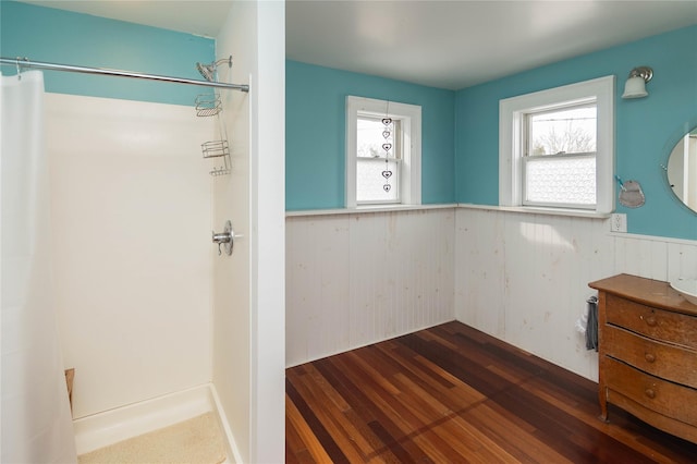 807 Lucas Avenue Ext, Hurley, NY 12443 - unfurnished bedroom with a wainscoted wall and wood finished floors