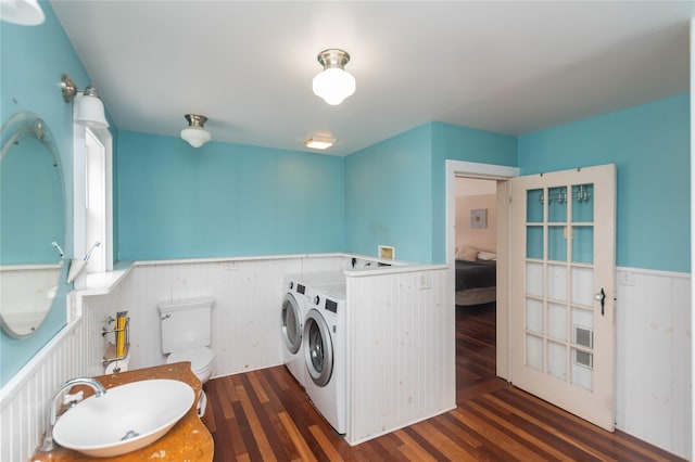 807 Lucas Avenue Ext, Hurley, NY 12443 - clothes washing area featuring washer and dryer, a wainscoted wall, and dark wood-style floors