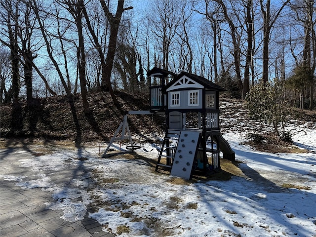 snow covered playground with a playground