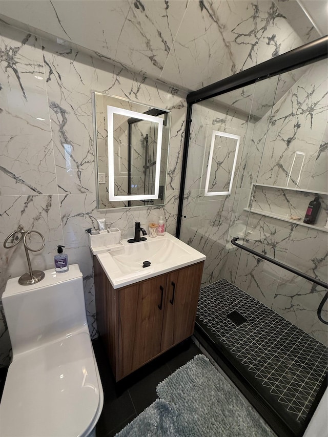 full bath with toilet, a stall shower, and vanity