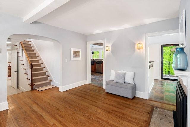 58 Spring Ln, Chappaqua, NY 10514 - entrance foyer with arched walkways, wood finished floors, and plenty of natural light